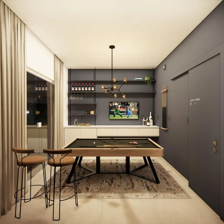 Espaço de jogos do Lar 264 com mesa de sinuca, bar e bancos altos