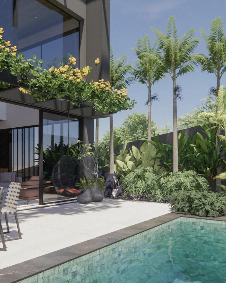 Área de refeições ao lado da piscina, com jardineiras floridas