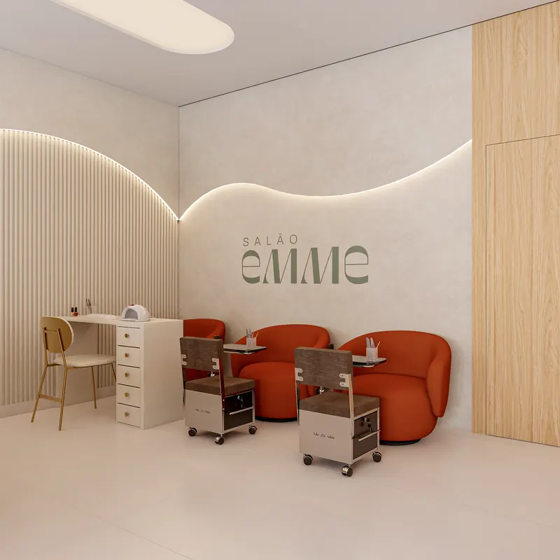Espaço de manicure com poltronas terracota e a marca do salão na parede
